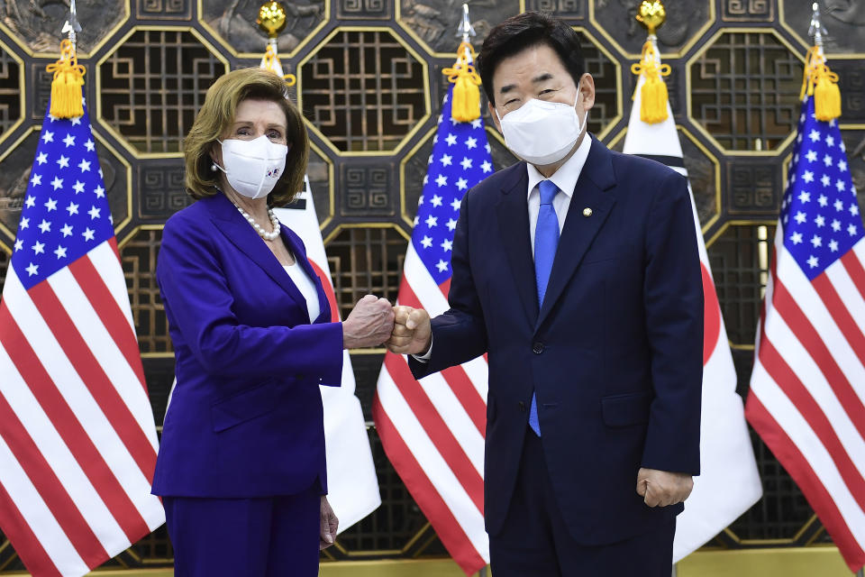 U.S. House Speaker Nancy Pelosi, left, poses with South Korean National Assembly Speaker Kim Jin Pyo before their meeting at the National Assembly in Seoul, South Korea Thursday, Aug. 4, 2022. (Kim Min-Hee/Pool Photo via AP)