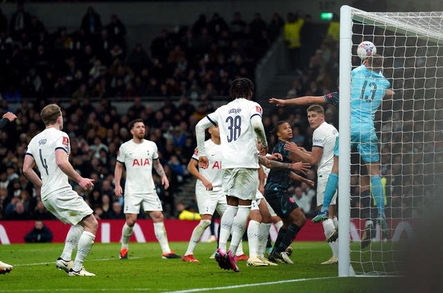 Manchester City’s Nathan Ake prods home after Guglielmo Vicario flapped at a corner