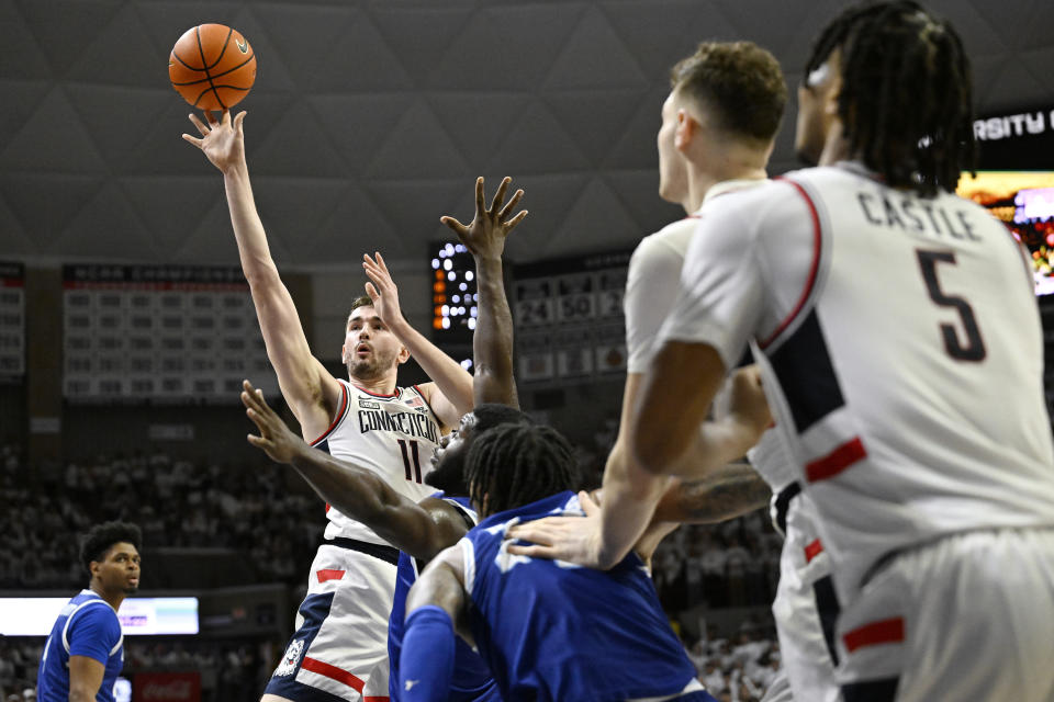 UConn forward Alex Karaban (11) shoots in the second half of an NCAA college basketball game against Seton Hall, Sunday, March 3, 2024, in Storrs, Conn. (AP Photo/Jessica Hill)
