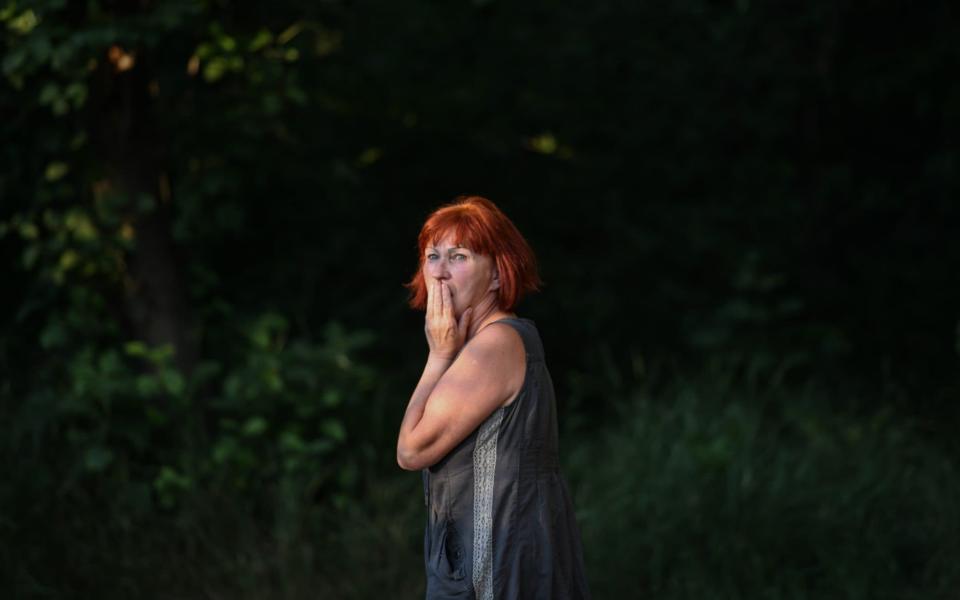 A resident is seen after shelling as Russian attacks continue on Ukraine in Donetsk, Ukraine - Stringer/Anadolu Agency