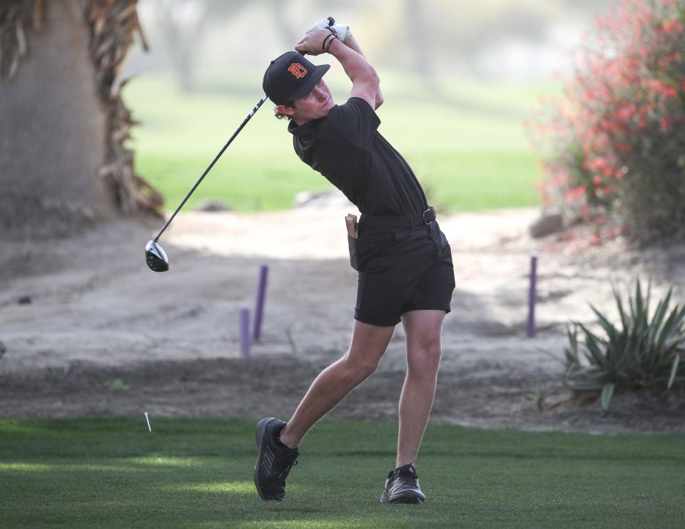 Luke Ringkamp of the Palm Desert High School golf team tees off on the first hole at Desert Willow Golf Resort in Palm Desert, Calif., Feb. 29, 2024.