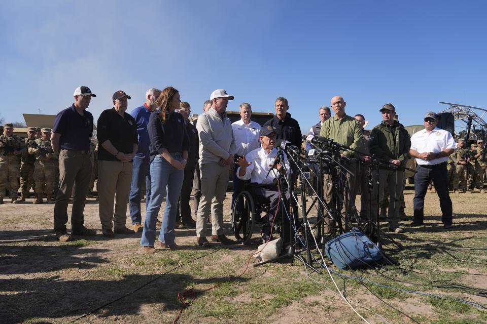 FILE - Texas Gov. Greg Abbott, center, is joined by fellow governors during a news conference along the Rio Grande to discuss Operation Lone Star and border concerns, Sunday, Feb. 4, 2024, in Eagle Pass, Texas. Louisiana lawmakers approved a bill Wednesday that would empower state and local law enforcement to arrest and jail people in the state who entered the U.S. illegally, (AP Photo/Eric Gay, file)