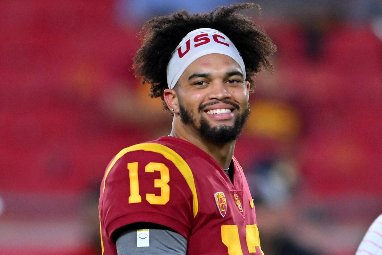 Quarterback Caleb Williams #13 of the USC Trojans smiles as he heads off the field prior to for the game against the Fresno State Bulldogs at United Airlines Field at the Los Angeles Memorial Coliseum on September 17, 2022 in Los Angeles, California.