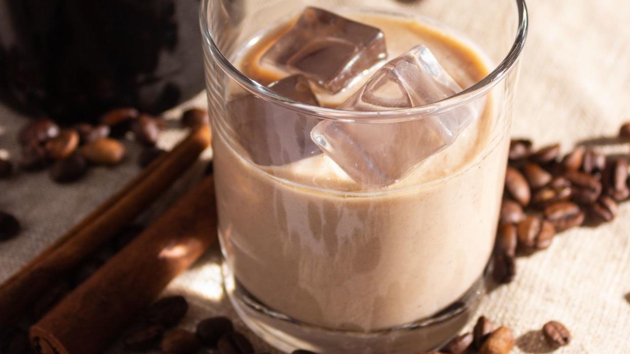 irish cream liqueur glass with ice and coffee beans