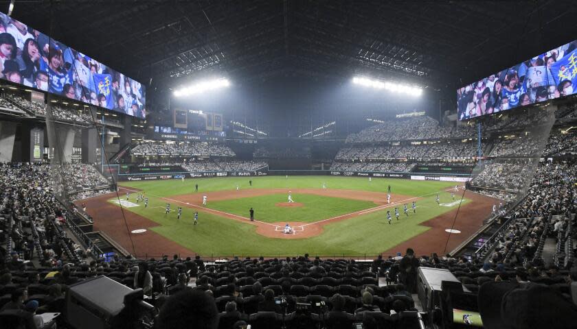 A Pacific League of Japanese Professional Baseball launches at ES CON Field Hokkaido, a new ballpark of Nippon Ham Fighters in Kitahiroshima, Hokkaido Prefecture on March 30, 2023. The opening game between Nippon Ham Fighters and Rakuten Eagles was held in a fully packed stadium. ( The Yomiuri Shimbun via AP Images )