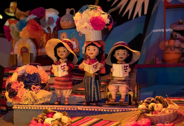 A new doll in a wheelchair (right) is featured in a scene representing South America inside Disneyland's 