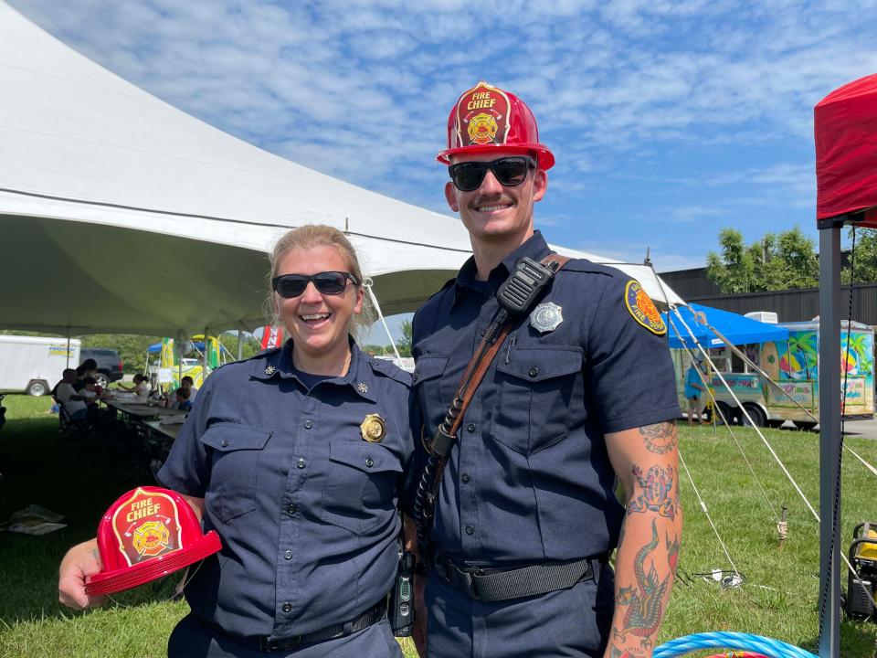 Chassity Pollard, deputy chief with the Karns Fire Department, with John Dorsett, engineer on squad one, were a big hit with the kids at the Karns Community Fair at Karns High School Saturday, July 16, 2022.