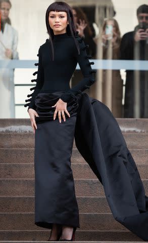 <p>Claudio Lavenia/Getty</p> Zendaya is seen during the Schiaparelli Haute Couture Spring/ Summer 2024 show as part of Paris Fashion Week on January 22, 2024.