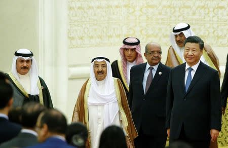 Chinese President Xi Jinping arrives with representatives of Arab League member state at a China Arab forum at the Great Hall of the People in Beijing, China, July 10, 2018. REUTERS/Thomas Peter