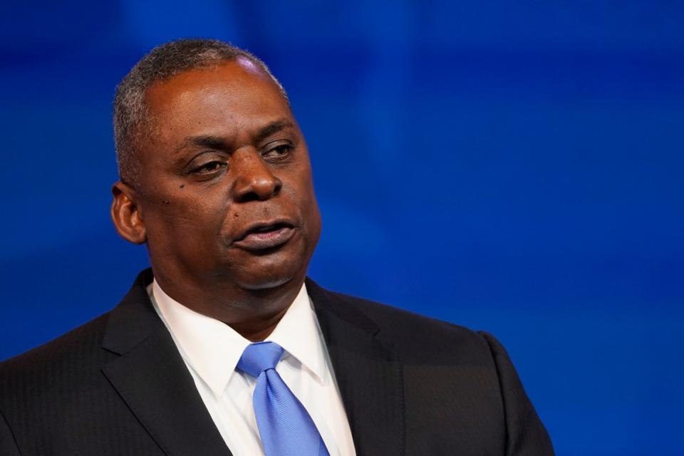 Retired Army Gen. Lloyd Austin, the Biden administration's choice to be secretary of defense, speaks during an event at The Queen theater. 