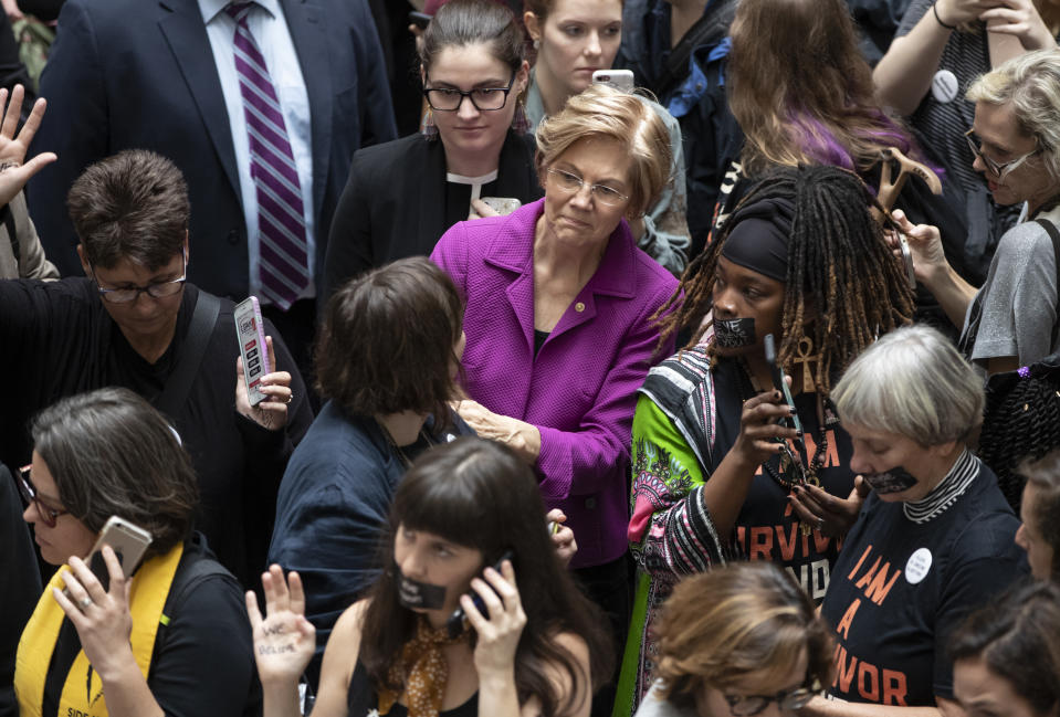 Protesters speak out as Kavanaugh hearing begins