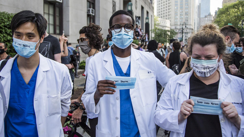 Medical workers, pictured here participating in a protest after the death of George Floyd.