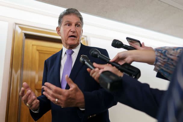 PHOTO: Sen. Joe Manchin talks to reporters outside a hearing room, July 21, 2022, at the Capitol in Washington, D.C. (J. Scott Applewhite/AP, FILE)