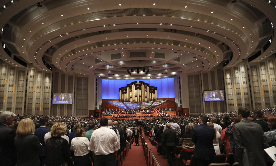 The Tabernacle Choir at Temple Square, center, performs during The Church of Jesus Christ of Latter-day Saints conference Saturday, April 6, 2019, in Salt Lake City. Church members are preparing for more changes as they gather in Utah for a twice-yearly conference to hear from the faith's top leaders. (AP Photo/Rick Bowmer)