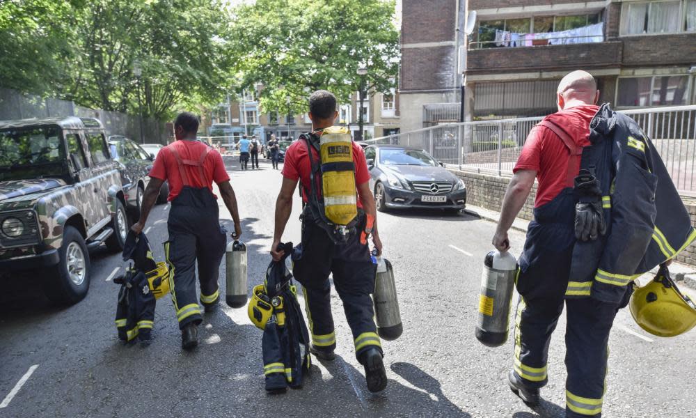 A fire crew arriving the the scene of the Grenfell Tower blaze