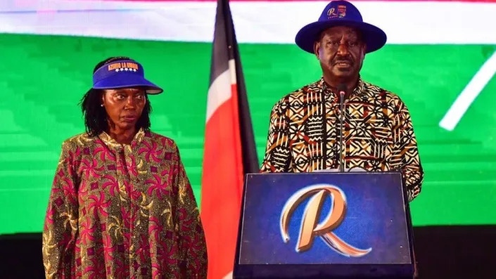 Kenya's defeated presidential candidate Raila Odinga (R) speaks during a press conference, flanked by his running mate Martha Karua (L), at the Kenyatta International Convention Centre (KICC) in Nairobi on August 16, 2022