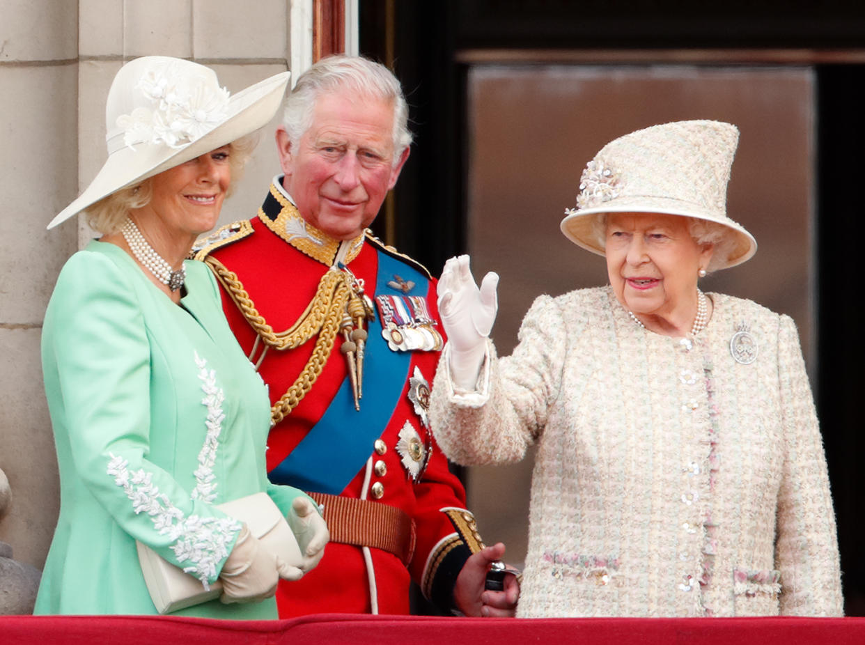 LONDON, UNITED KINGDOM - JUNE 08: (EMBARGOED FOR PUBLICATION IN UK NEWSPAPERS UNTIL 24 HOURS AFTER CREATE DATE AND TIME) Camilla, Duchess of Cornwall, Prince Charles, Prince of Wales and Queen Elizabeth II watch a flypast from the balcony of Buckingham Palace during Trooping The Colour, the Queen's annual birthday parade, on June 8, 2019 in London, England. The annual ceremony involving over 1400 guardsmen and cavalry, is believed to have first been performed during the reign of King Charles II. The parade marks the official birthday of the Sovereign, although the Queen's actual birthday is on April 21st. (Photo by Max Mumby/Indigo/Getty Images)