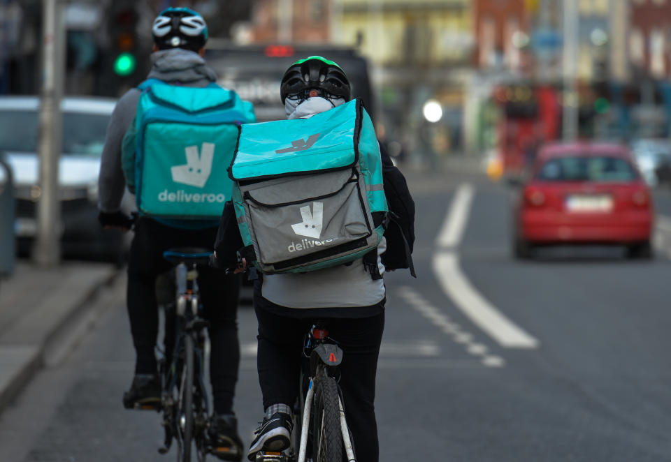 Deliveroo curriers seen in Dublin city center during Level 5 Covid-19 lockdown. 
On Wednesday, 3 February, 2021, in Dublin, Ireland. (Photo by Artur Widak/NurPhoto via Getty Images)