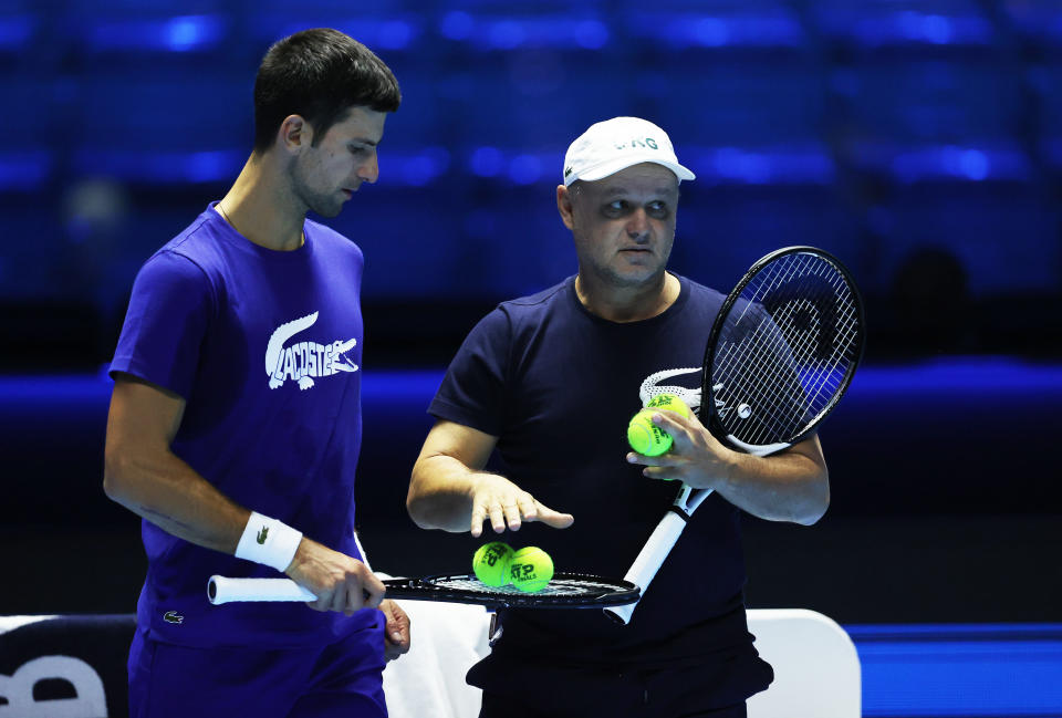 Novak Djokovic, pictured here with Marian Vajda during a practice session at the ATP Tour Finals in 2021.