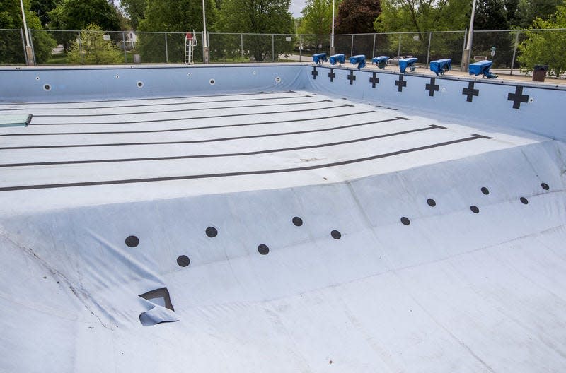 Shown in a 2017 file photo, Merrifield Pool was significantly damaged after vandals poked multiple holes and made large cuts into the liner. Tribune Photo/ROBERT FRANKLIN