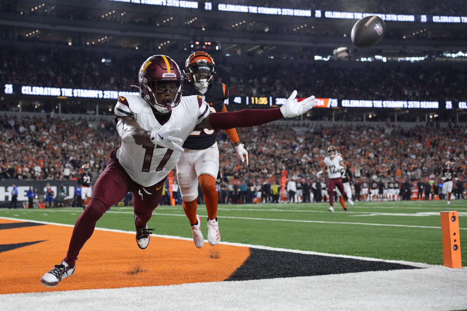 Washington Commanders wide receiver Terry McLaurin (17) reaches for an incomplete pass in front of Cincinnati Bengals cornerback Cam Taylor-Britt, rear, during the second half of an NFL football game, Monday, Sept. 23, 2024, in Cincinnati. (AP Photo/Carolyn Kaster)