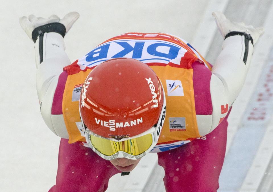 World Cup leader Eric Frenzel of Germany starts for jumping during the individual Gundersen competition at the Nordic Combined FIS World Cup in Oberstdorf, southern Germany, Sunday, Jan. 26, 2014. He placed third after the jumping. (AP Photo/Jens Meyer)