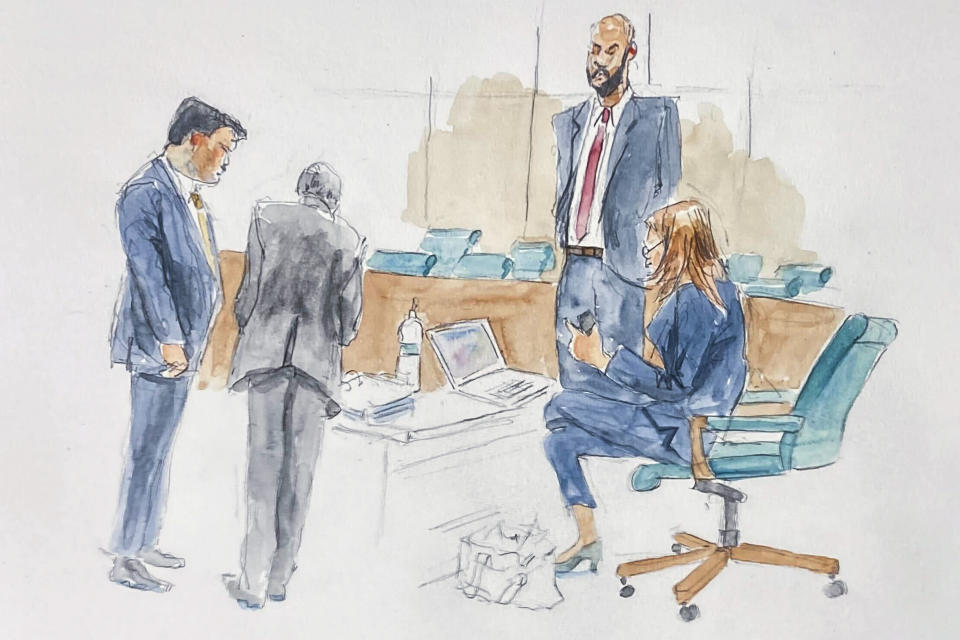 In this courtroom sketch, lead prosecutor Kaitlin Farrell, far right, and her prosecution team review transcripts of witness Alejandro Burzaco, requested by jury, during deliberation in the trial of two former Fox executives accused of paying bribes for broadcasting rights to FIFA soccer matches, including the World Cup, Wednesday March 8, 2023, in New York. (Aggie Whelan Kenny via AP)