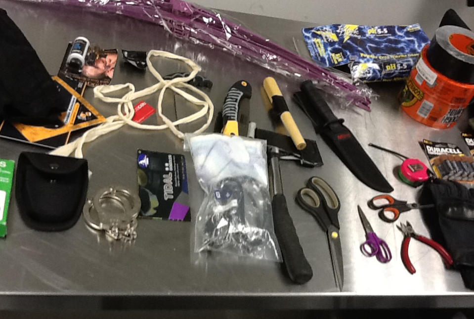 This image provided by the Los Angeles Police Department shows material seized from the luggage of Yongda Huang Harris while trying to enter the United States at Los Angeles International Airport. A detention hearing was held Friday Oct. 12, 2012 for Harris where he was remanded back into custody. (AP Photo/LAPD)