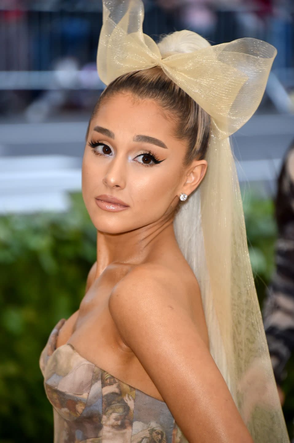 14) Ariana With A Platinum Ponytail And Tulle Bow