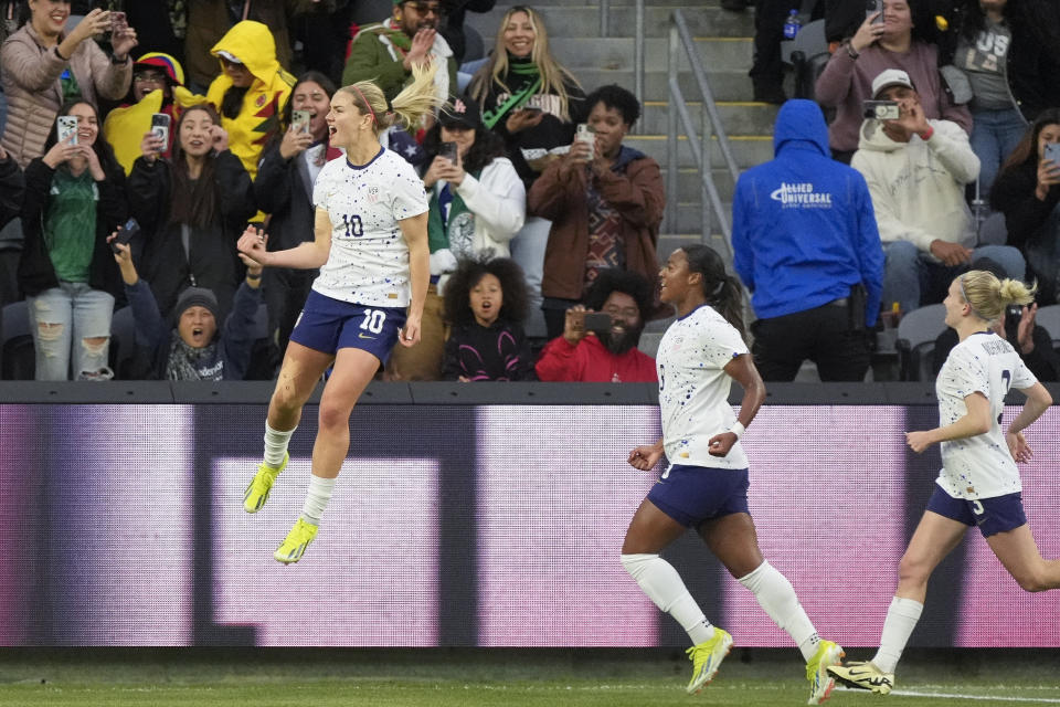 United States midfielder Lindsey Horan (10) celebrates after scoring on a penalty kick during the first half of a CONCACAF Gold Cup women's soccer tournament quarterfinal against Colombia, Sunday, March 3, 2024, in Los Angeles. (AP Photo/Marcio Jose Sanchez)