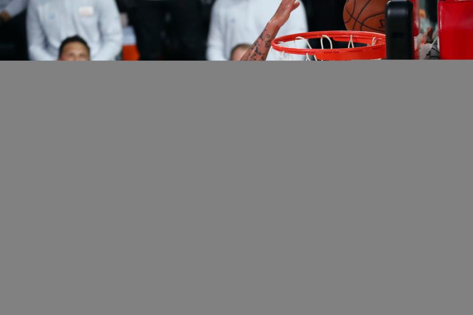 Los Angeles Lakers forward Anthony Davis (3) blocks a shot by Portland Trail Blazers guard Damian Lillard (0) as Lakers forward Kyle Kuzma (0) looks on during the first half of Game 2 of an NBA basketball first-round playoff series, Thursday, Aug. 20, 2020, in Lake Buena Vista, Fla. (Kim Klement/Pool Photo via AP)