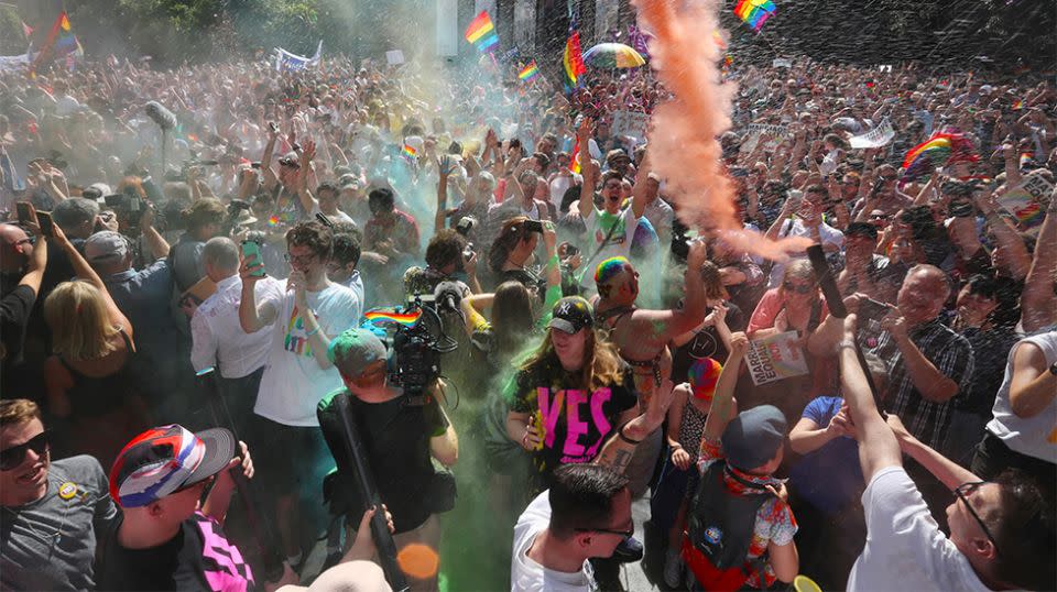 Revellers celebratein Melbourne after the Yes vote announcement. Source: AAP