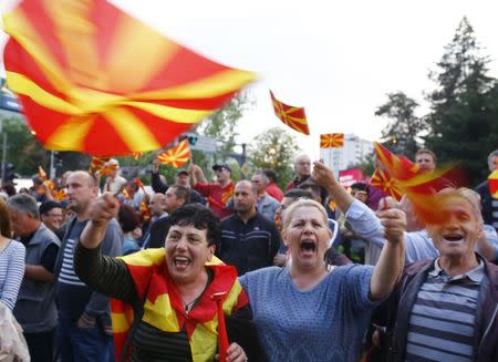 Protesters demonstrate in front of the EU Info Center building in Skopje, Macedonia, April 28, 2017. REUTERS/Ognen Teofilovski