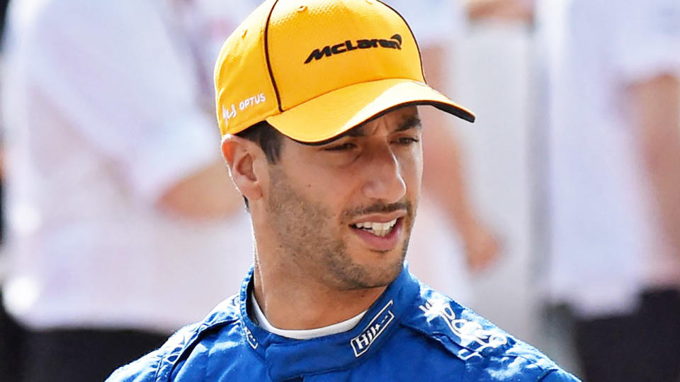 Daniel Ricciardo is pictured wearing his McLaren race suit.
