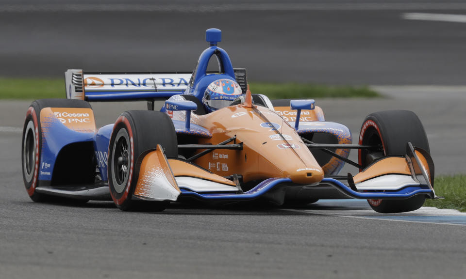 Scott Dixon, of New Zealand, steers his car during qualifications for the Indy GP IndyCar auto race at Indianapolis Motor Speedway, Friday, May 10, 2019 in Indianapolis. (AP Photo/Darron Cummings)