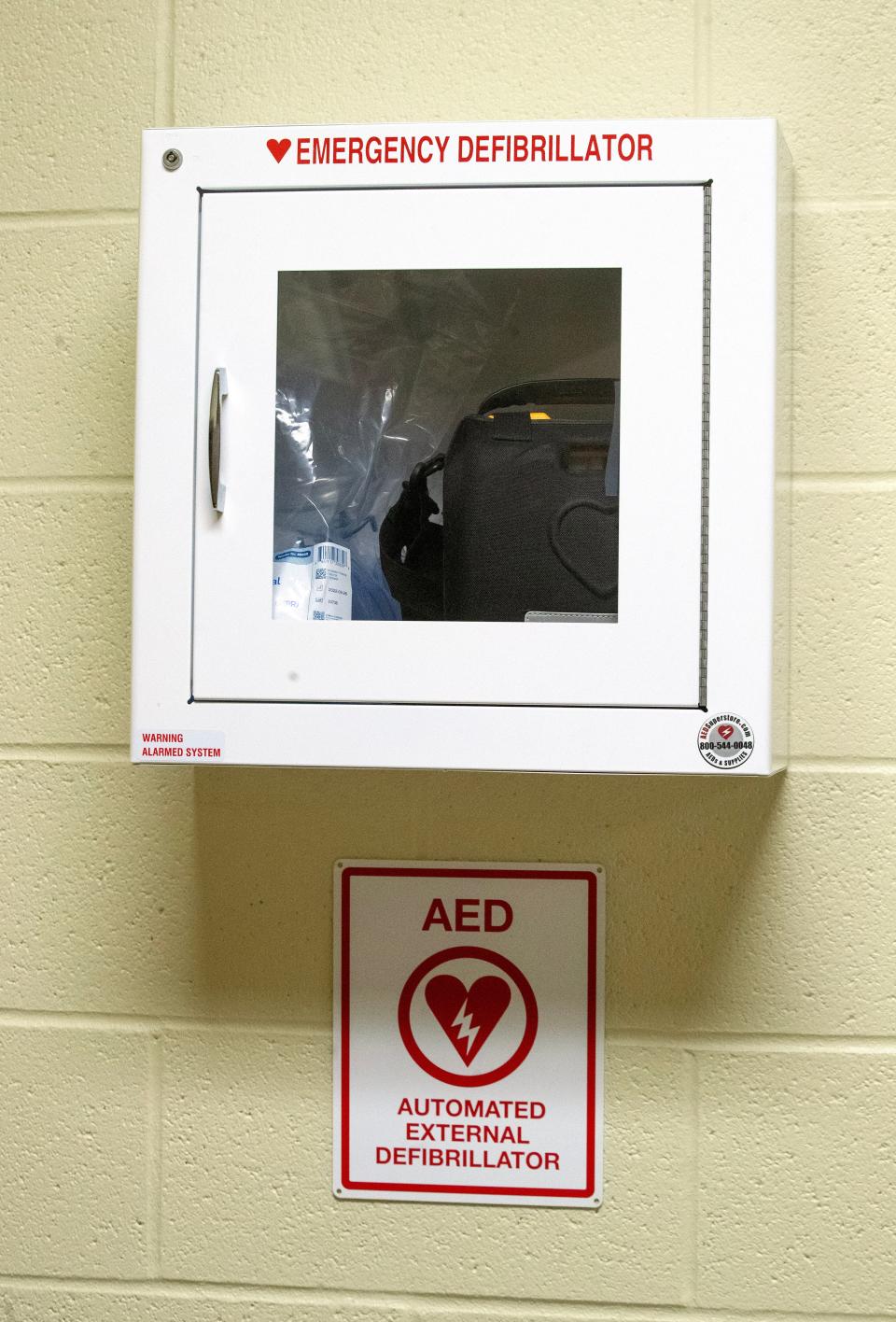 An automated external defibrillator is mounted outside the exercise room at the Paul and Carol David YMCA in Jackson Township. The AED was used in February to save Joey Mohr's life.