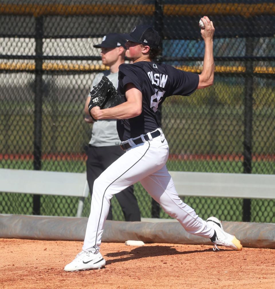 Detroit Tigers pitchers and catchers went through drills and a bullpen session during spring training on Thursday, Feb. 17, 2023 at TigerTown in Lakeland, Florida.  Pitcher Reese Olson throws during a bullpen session.