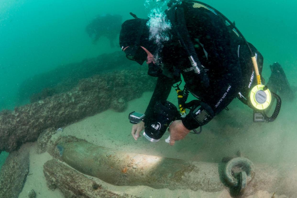 Divers are seen during the discovery of the historic wreck: REUTERS