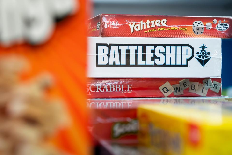 Board games including Yahtzee, Battleship and Scrabble are displayed inside Let's Play: Games and Hobbies in Hanover.