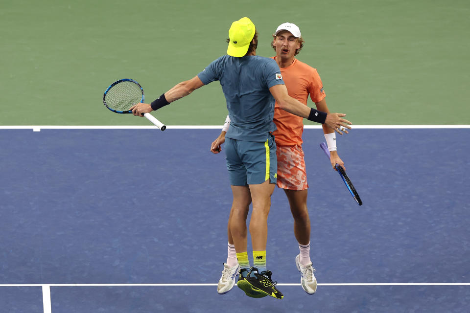 NEW YORK, NEW YORK - SEPTEMBER 05:  Jordan Thompson of Australia (L) celebrates match point with partner Max Purcell of Australia against Nathaniel Lammons of the United States and partner Jackson Withrow of the United States during their Men's Doubles Semifinal match on Day Eleven of the 2024 US Open at USTA Billie Jean King National Tennis Center on September 05, 2024 in the Flushing neighborhood of the Queens borough of New York City. (Photo by Matthew Stockman/Getty Images)