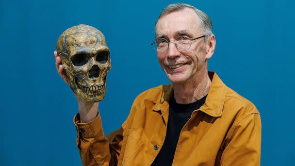 PHOTO: Svante Paabo, holds a model of a Neanderthal skeleton at the end of a press conference, after he won the Nobel Prize in Physiology or Medicine on Oct. 3, 2022 in Leipzig, Germany.  (Jens Schlueter/Getty Images)