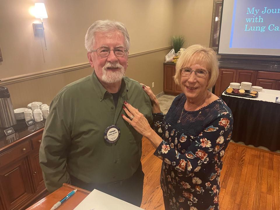 Darlene Leonard, right, pins a Ukainian Relief Rotary Pin on Endicott Rotary member Stephan Wasylko for his work with the Ukrainian refugee community. Leonard will mark 25 years as a member of the Endicott Rotary Club in July.