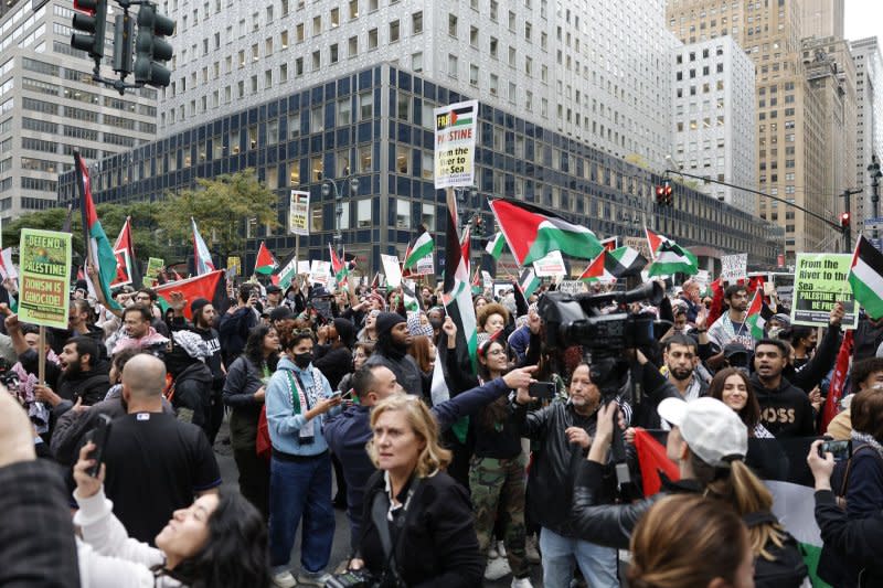 Palestine supporters march on the streets of Manhattan an Emergency Rally for Gaza event on Monday in New York City. Israel's military is trying to gain control of all communities around Gaza more than 2 days after Hamas launched a surprise assault in which more than 700 people were killed. Photo by John Angelillo/UPI