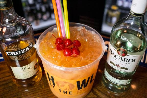 Cherries complete the look of the rum-infused Hurricane Bucket at Howl at the Moon. 5/20/15