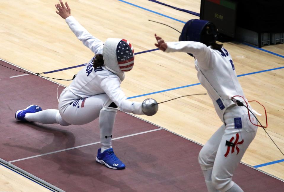 Margherita Guzzi Vincenti, from USA, and Shams Wong, from Hong Kong, during the The 55th International Ciutat de Barcelona World Cup Women's Epee Fencing
tournament, in Barcelona, February 2022.