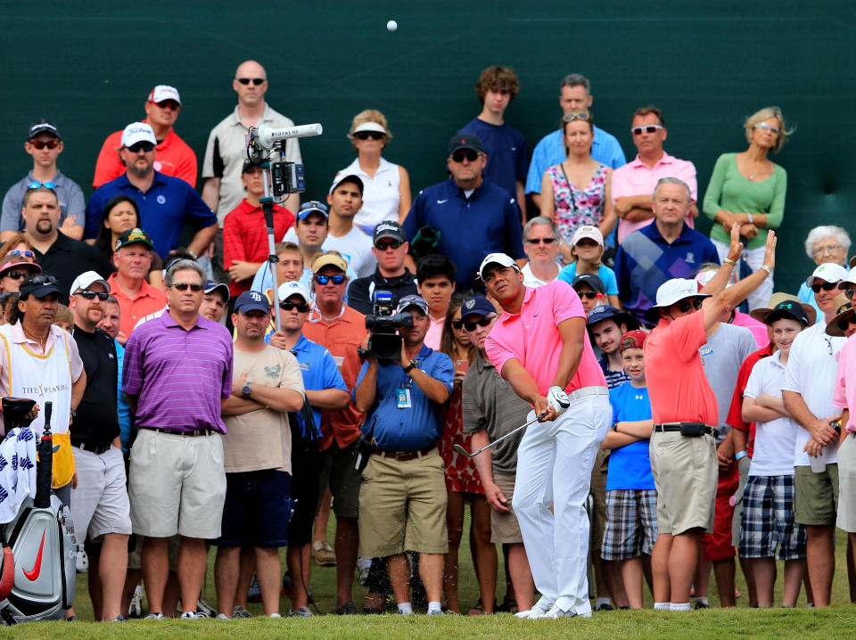 PONTE VEDRA BEACH, FL - MAY 13: Jhonattan Vegas of Venezuela hits a chip shot after making a drop on the ninth hole during the final round of THE PLAYERS Championship held at THE PLAYERS Stadium course at TPC Sawgrass on May 13, 2012 in Ponte Vedra Beach, Florida. (Photo by David Cannon/Getty Images)