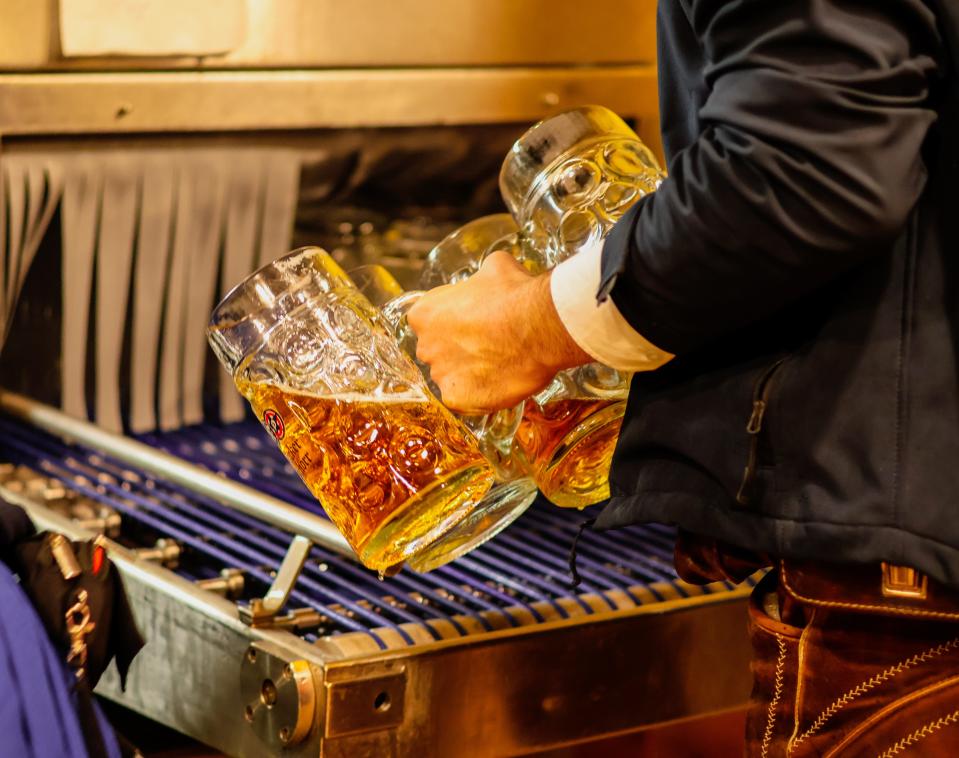 Mugs of beer at Oktoberfest in Munich, Germany.