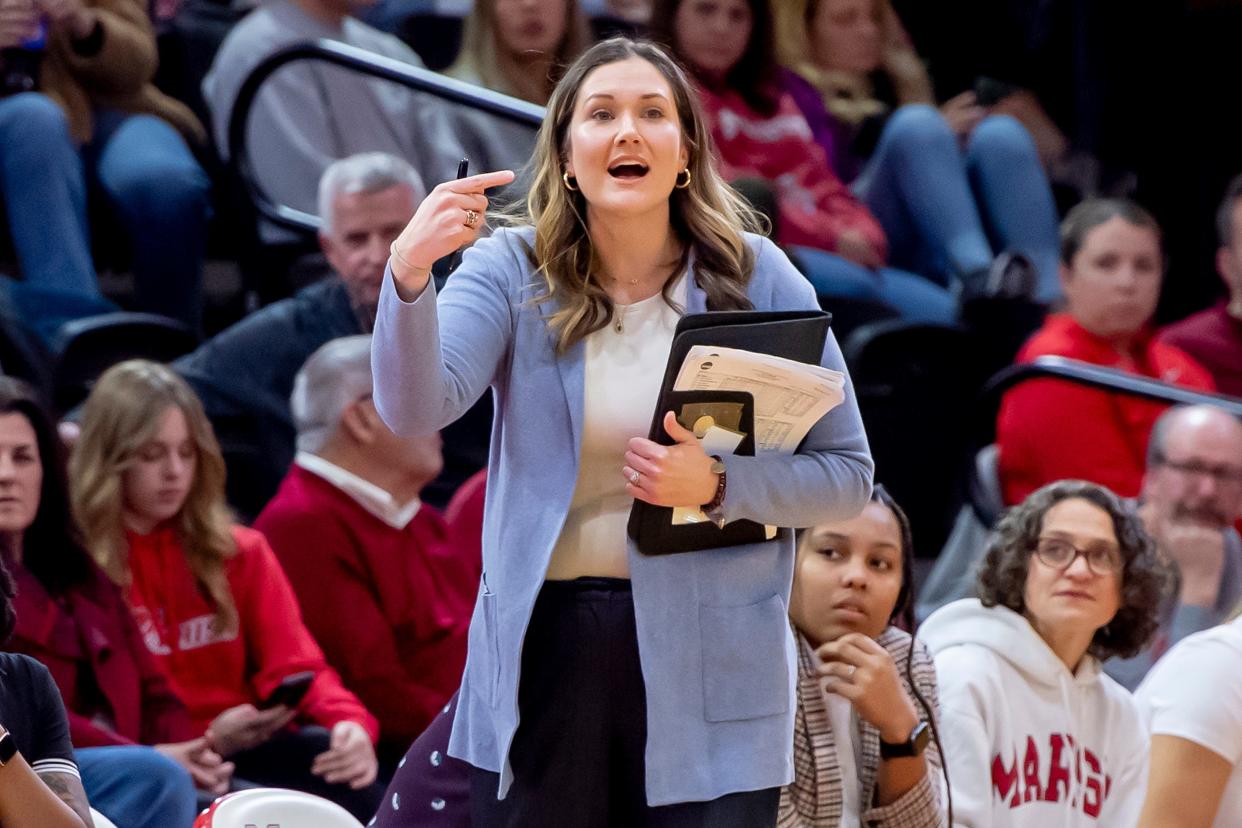 Erin Doughty gives instructions to the Marist College women's basketball players during a Feb. 2023 game.