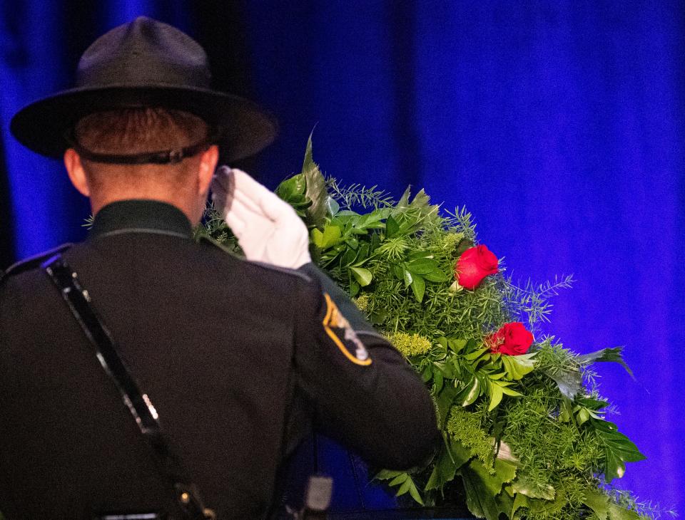 A fallen deputy is honored at The Lee County Sheriff's Office Fallen Deputies Memorial Service at the Caloosa Sound Convention Center in Fort Myers on Tuesday, May 14, 2024. Eleven fallen deputies were honored at the ceremony.