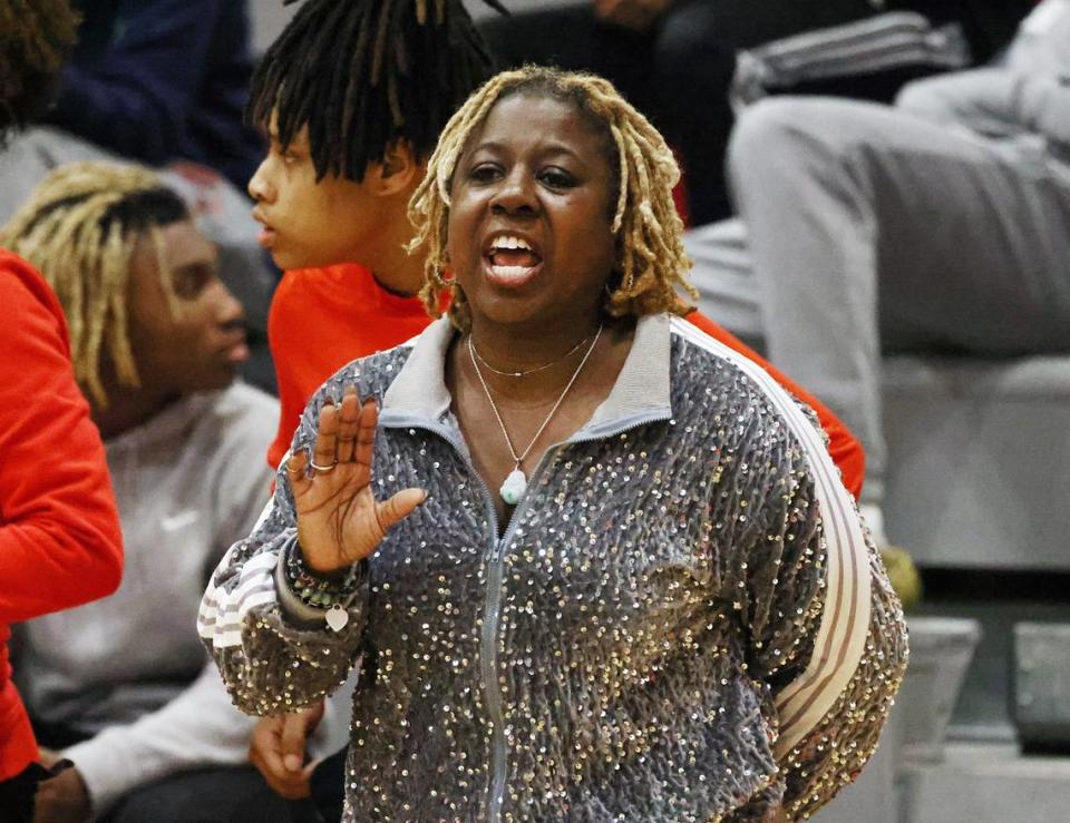 South Pointe High School girls basketball coach Stephanie Butler-Graham coaches from the sideline Tuesday at the game against East Side.